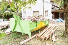 large skip bin full of building waste