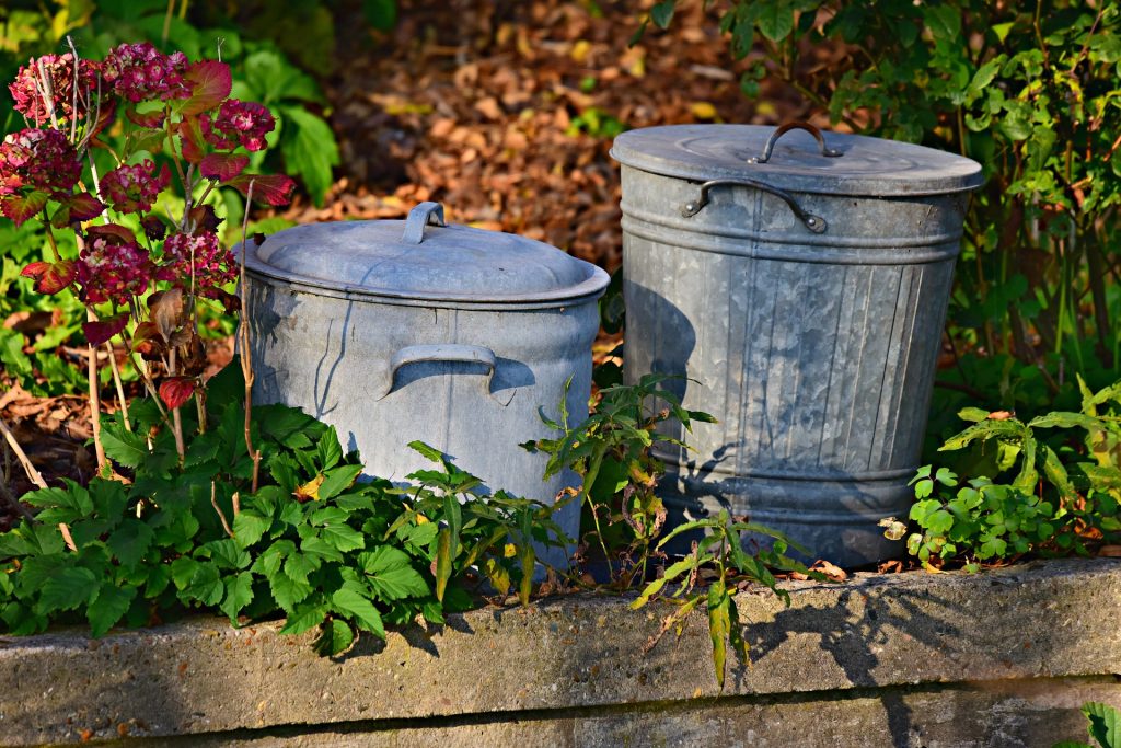 small trash can in the garden