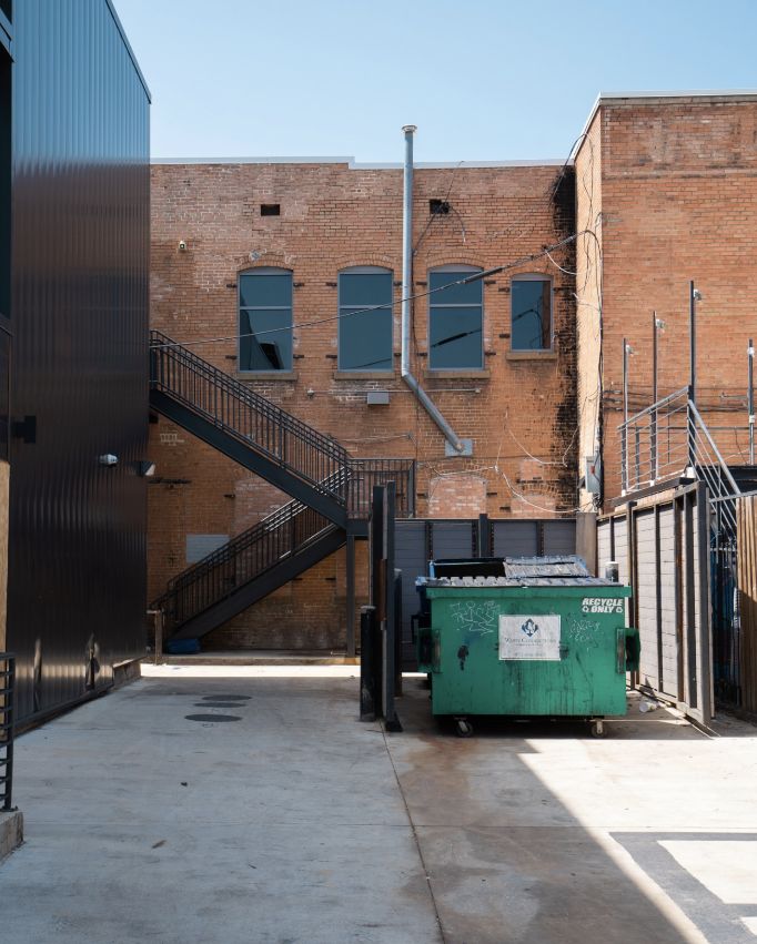 skip bin in alley