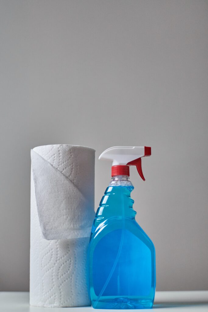 Cleaning product and tissue paper on a table